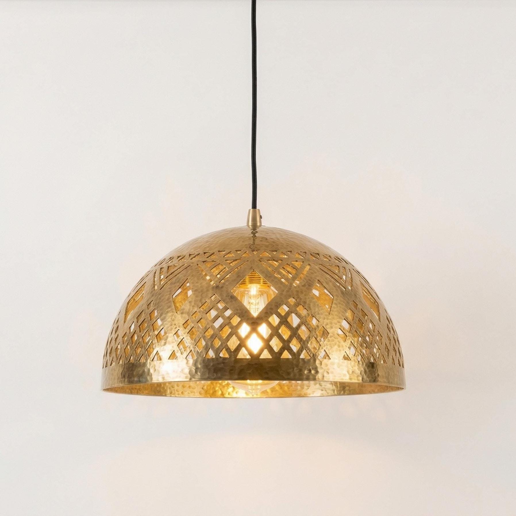 Handmade brass ceiling light with hammered dome and geometric cutouts